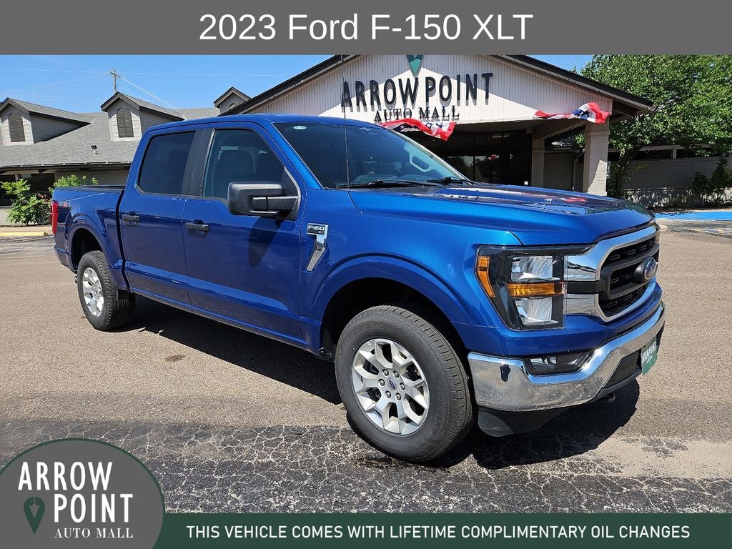 2023 Ford F-150 XLT in Blue Metallic — front three-quarter view