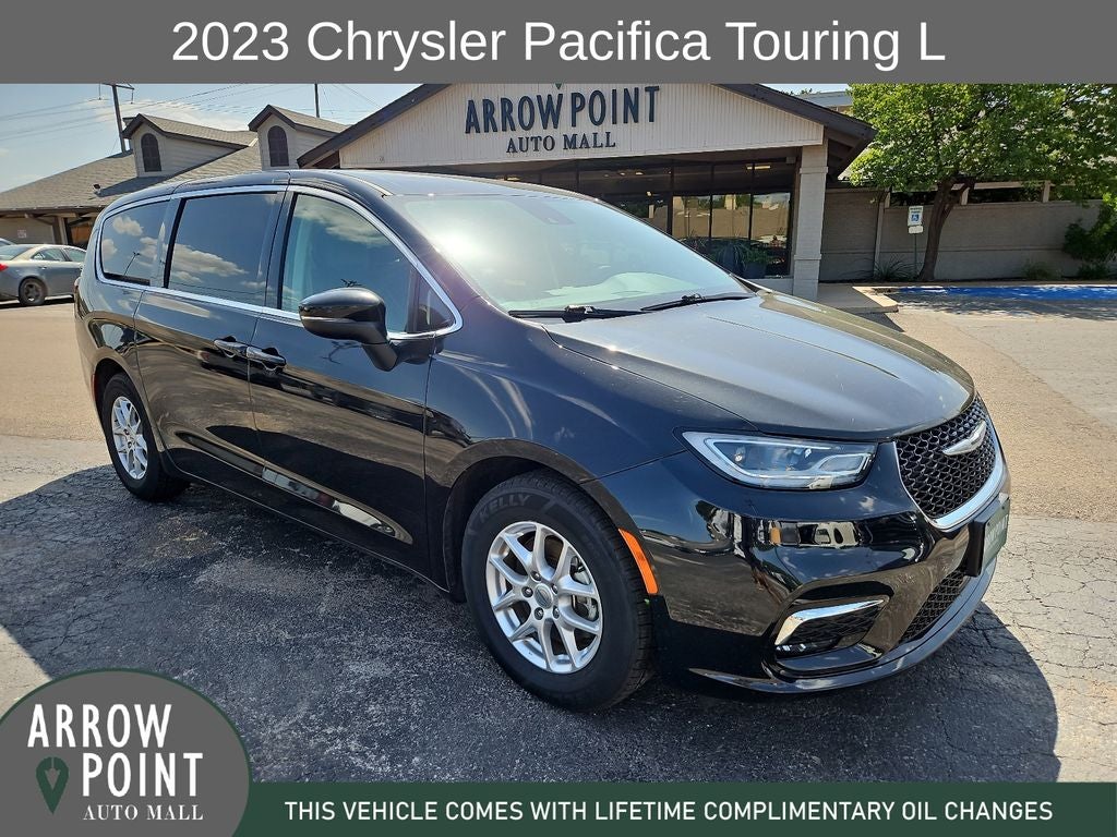 2023 Chrysler Pacifica Touring L in Brilliant Black Crystal Pearlcoat — front three-quarter view