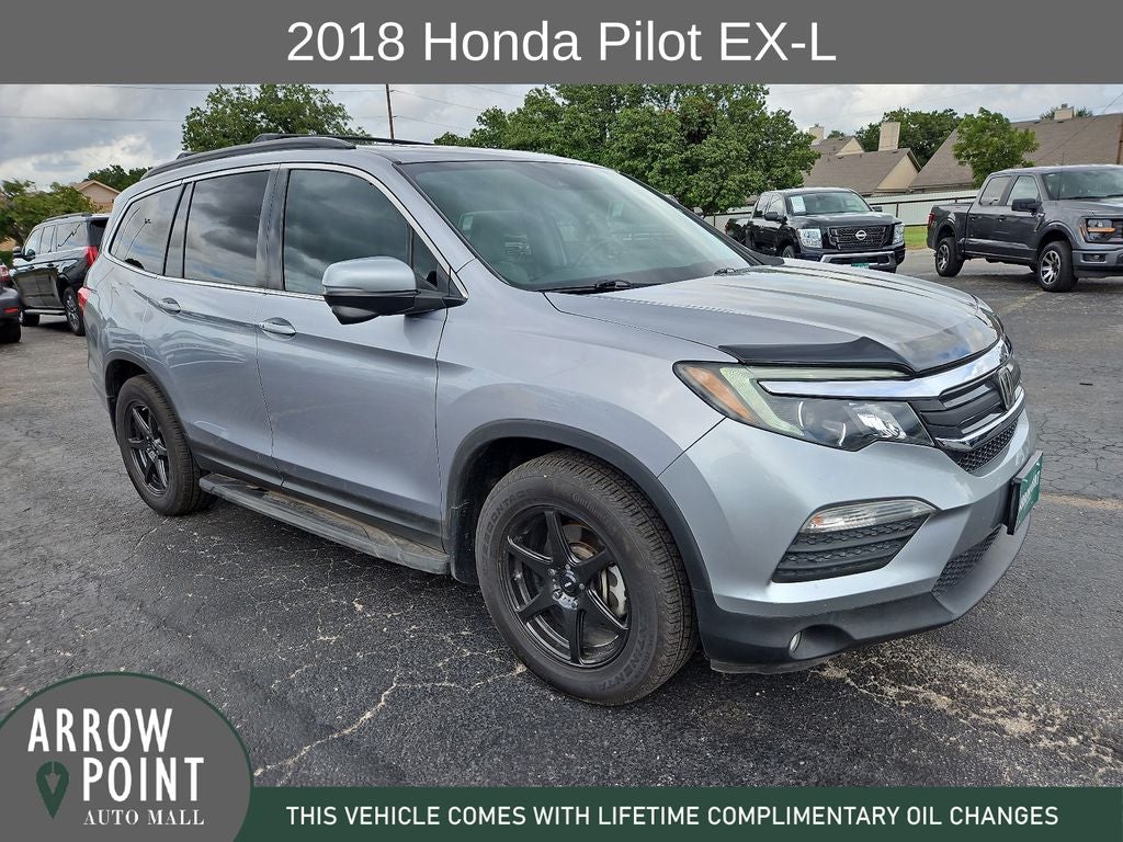 2018 Honda Pilot EX-L w/Honda Sensing in Silver Metallic — front three-quarter view